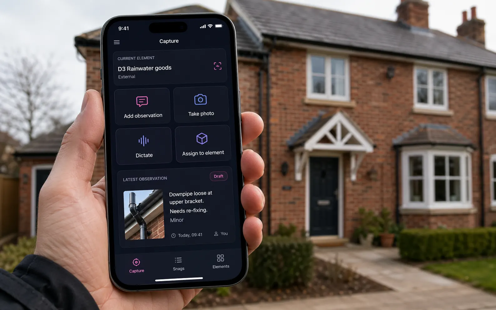 Phone running the snagging capture app in front of a red-brick new-build — current element D3 Rainwater goods, four big-tap actions Add observation / Take photo / Dictate / Assign to element, latest observation card showing 'Downpipe loose at upper bracket. Needs re-fixing.' tagged Minor